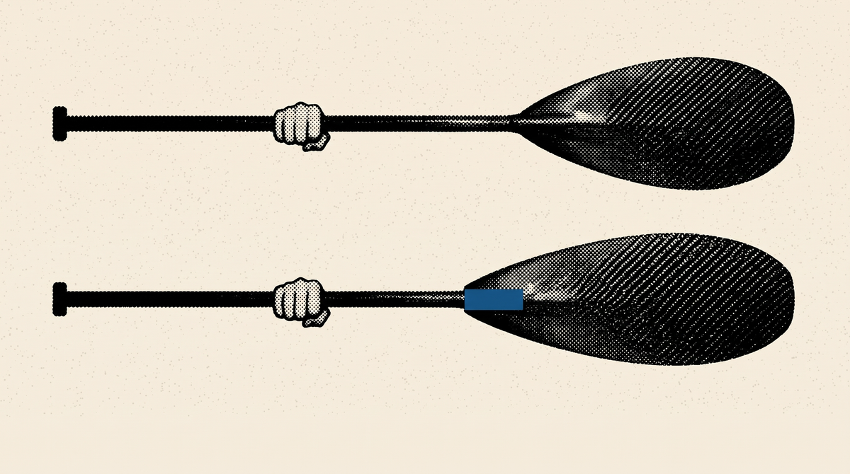 Two outrigger paddles drawn at the same total length, one above the other: the upper has a standard blade and a long run of shaft, the lower has a longer steering blade and the shaft it takes away marked in blue at the throat.