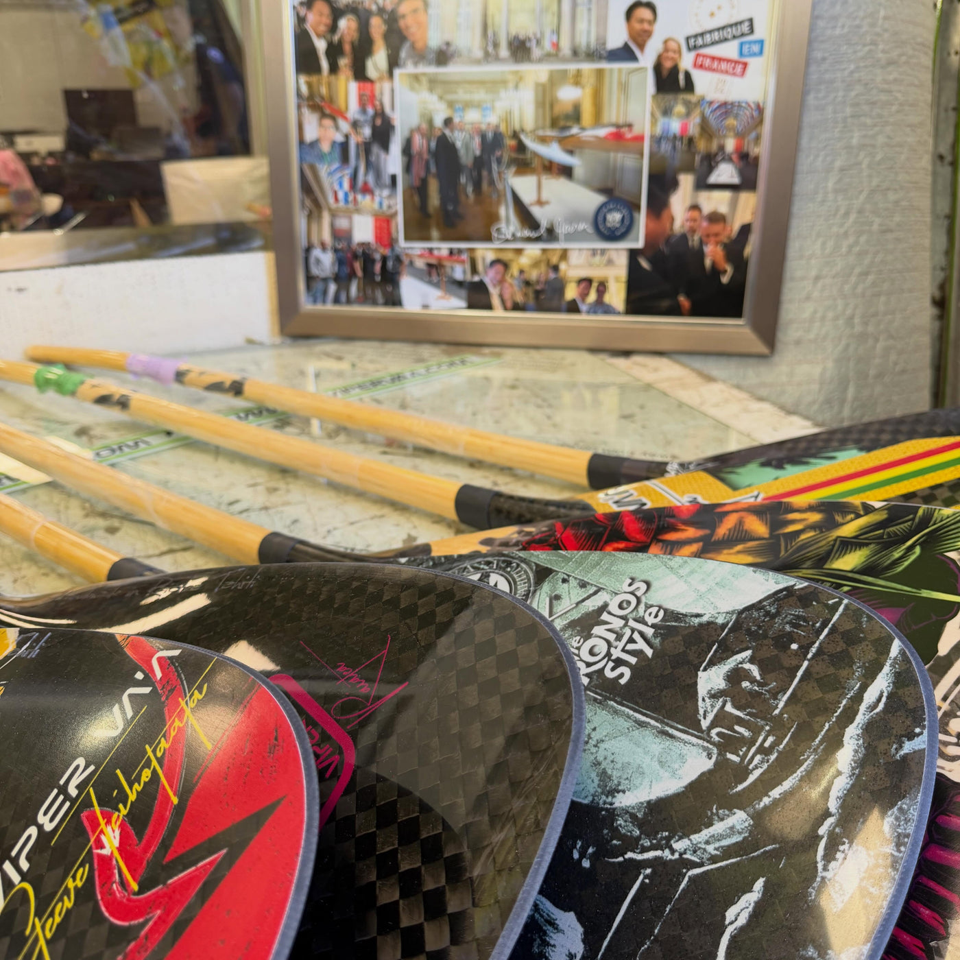 Carbon-weave blades and bamboo shafts on the ProShop counter — photo @vipervaa